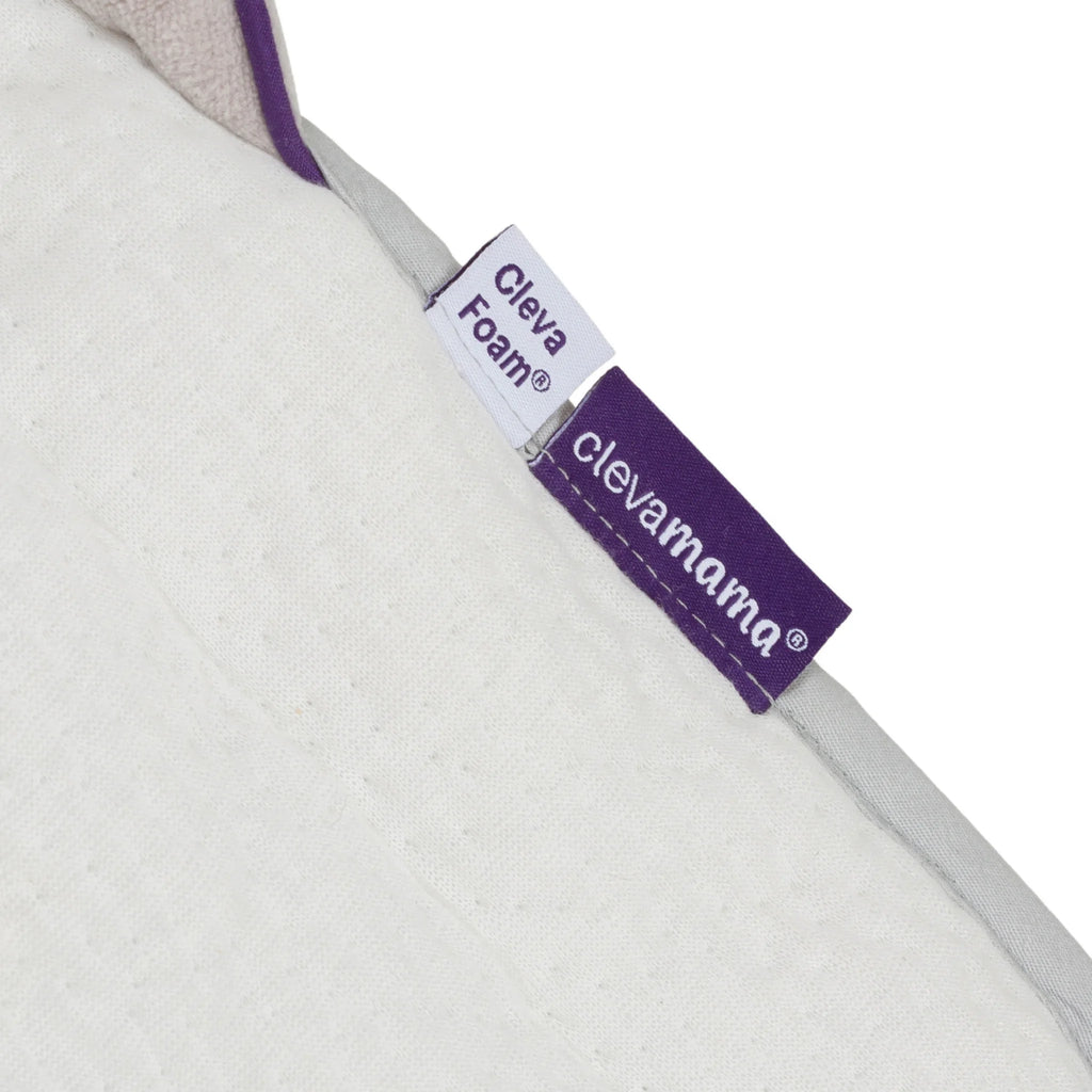 Close-up of ClevaMama ClevaFoam Baby Head & Body Support V2 fabric label – breathable hypoallergenic infant cushion insert for car seats, strollers and bouncers.